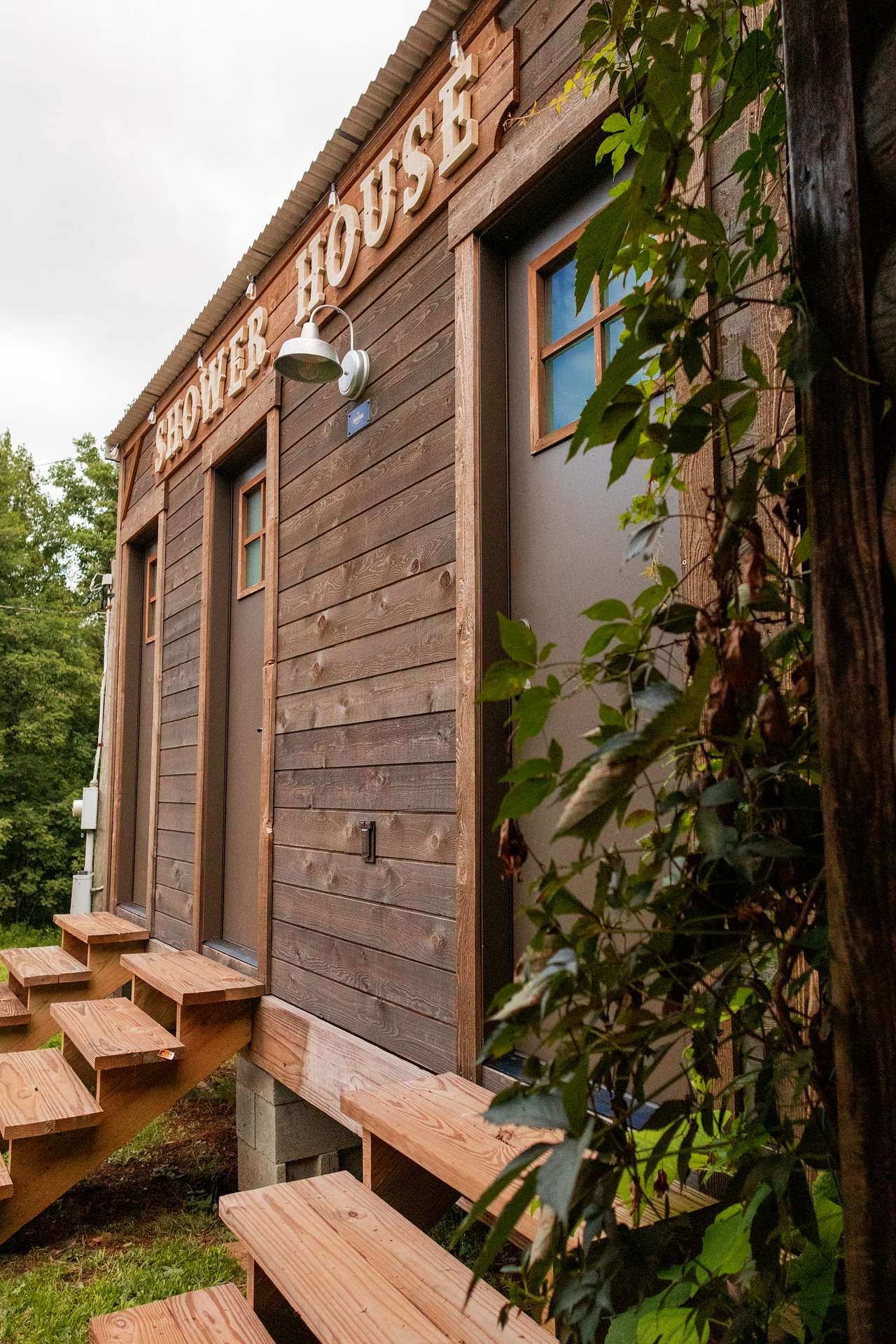 The shower house just outside the bell tents and tent platforms