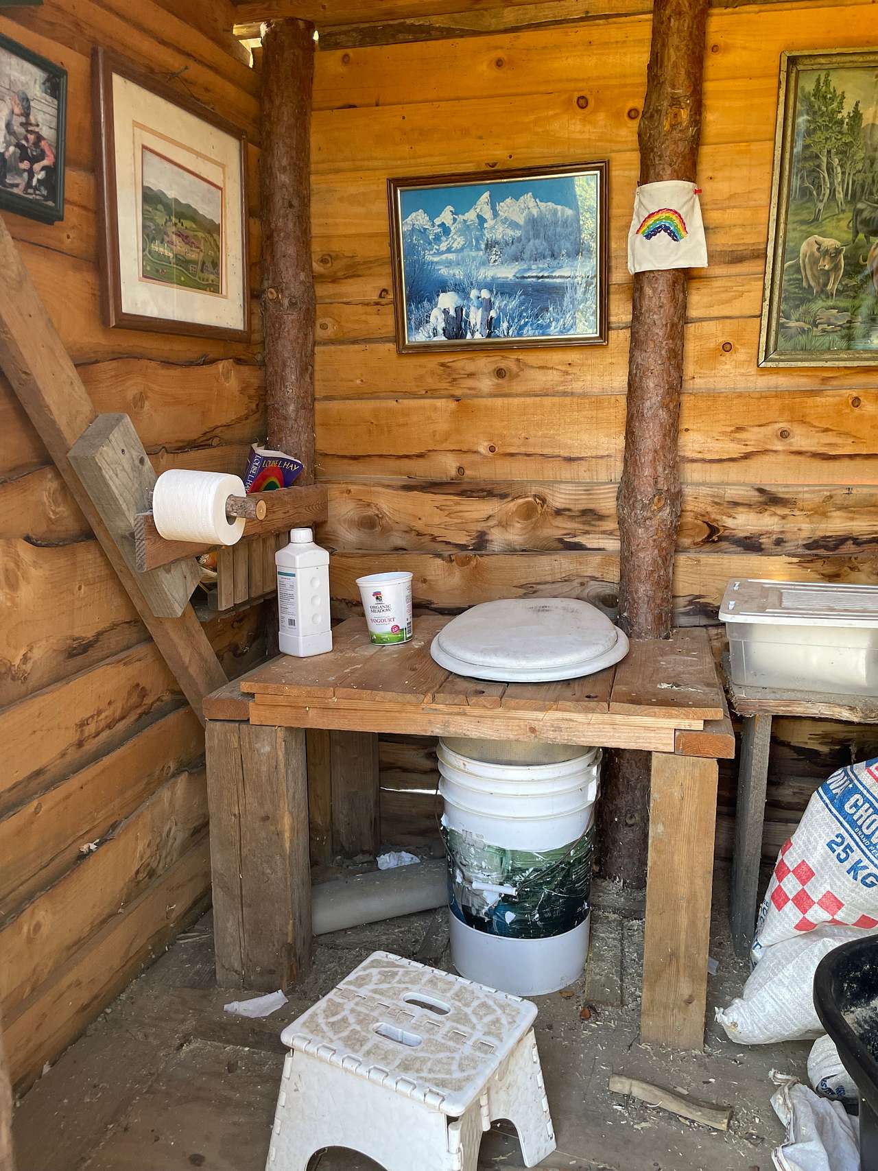 The inside of the environmentally friendly composting toilet outhouse