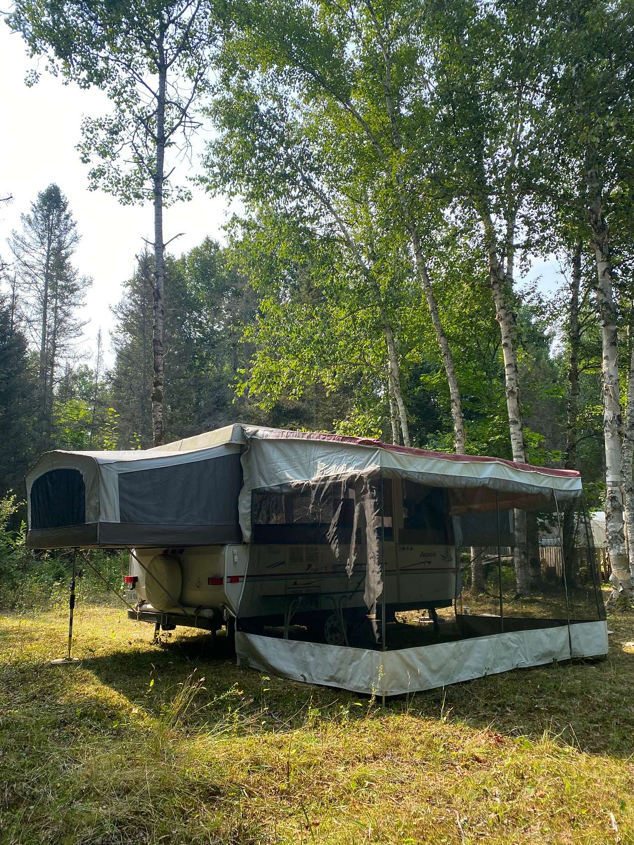Queen size bed, exterior view.

Screened in Add-a-room provides additional chill space, outdoors (extra chairs and table can be provided).