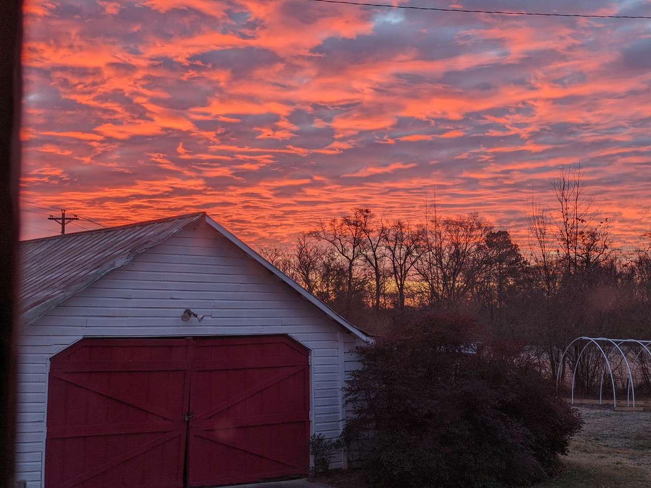 A stunning sunset over the garage