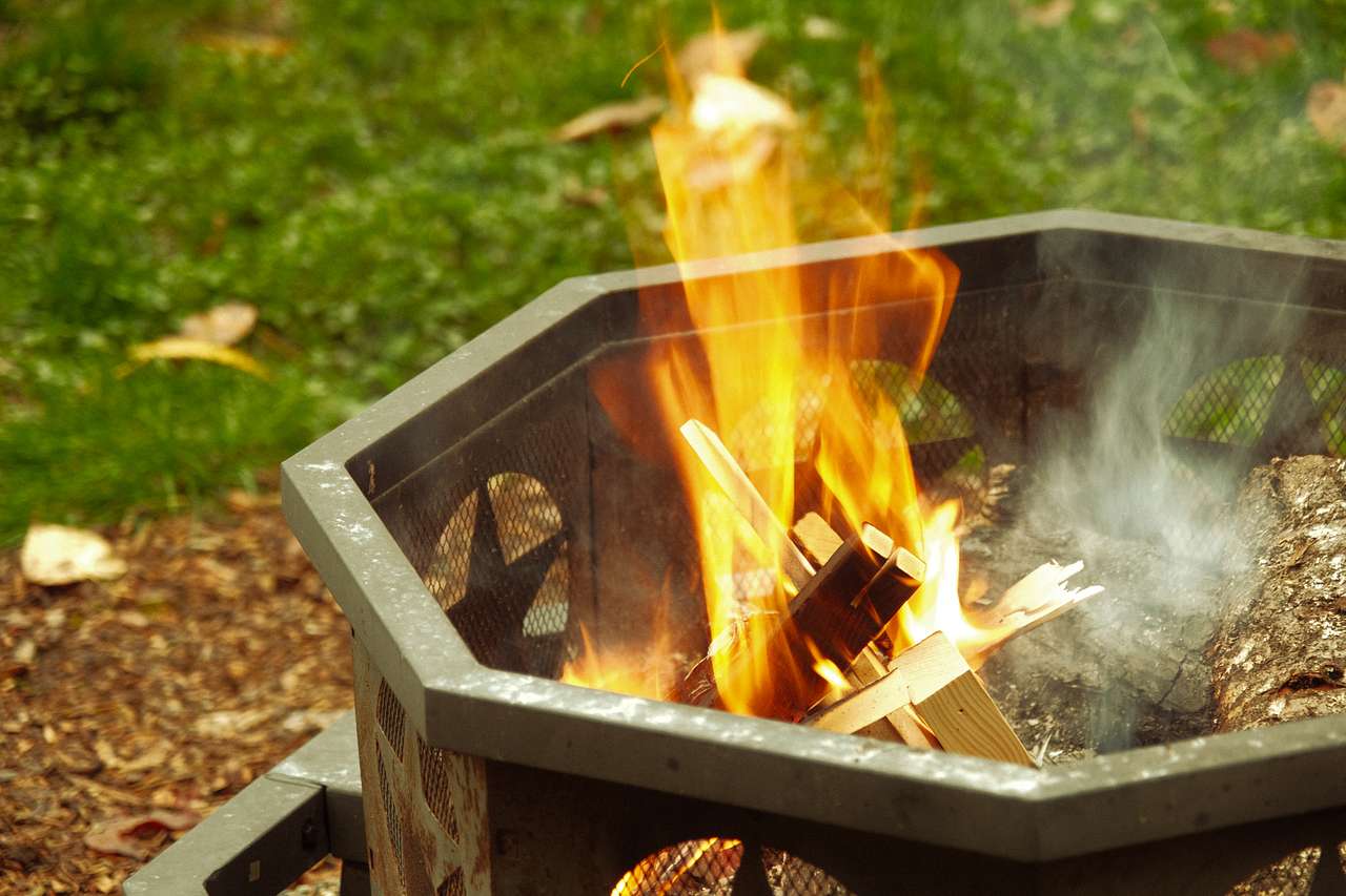 Enjoying the campfire.