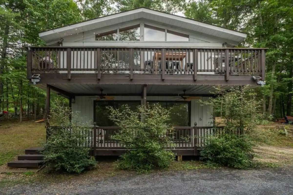 The cozy front facade with both porches in view