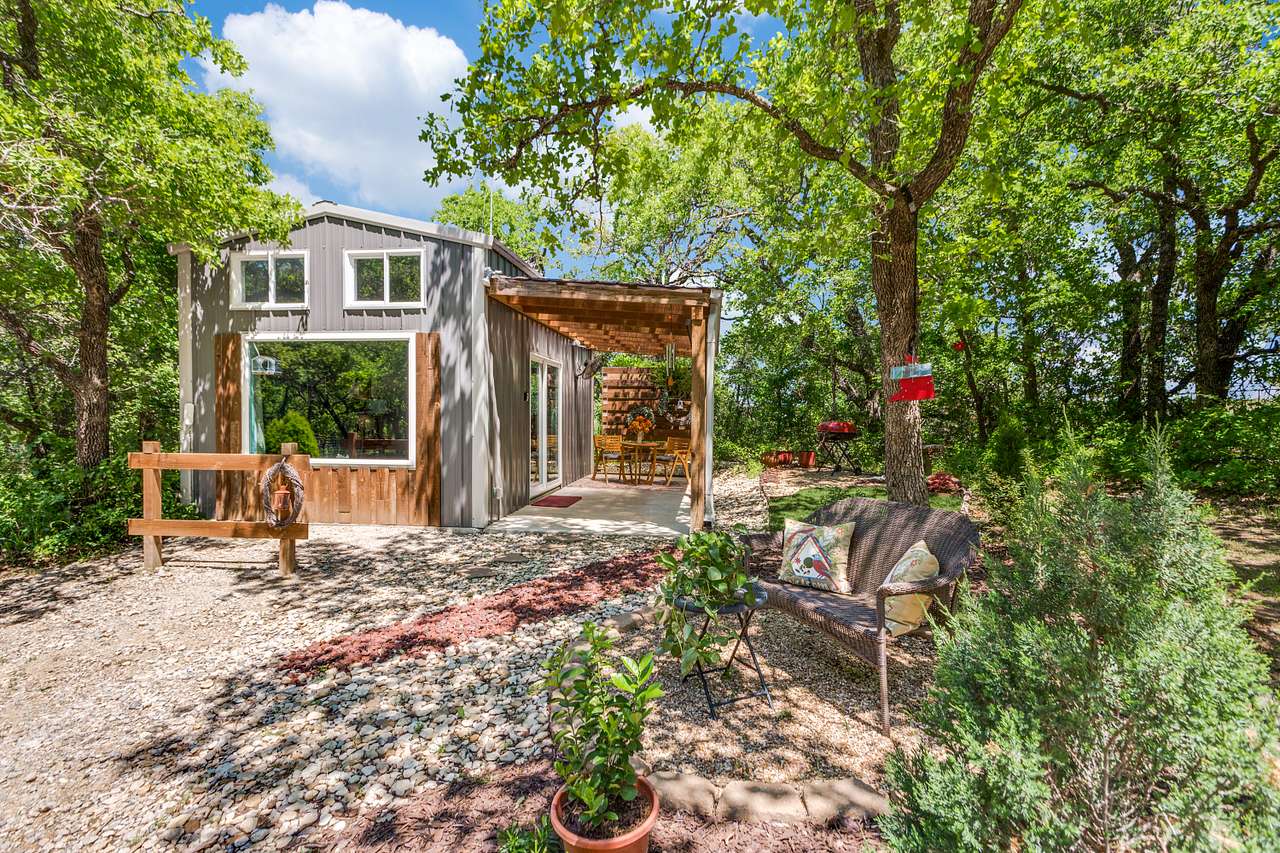 The Hidden Treasure Harvest House is our first cabin we built in 2018. Very functional tiny house with a small kitchen. 