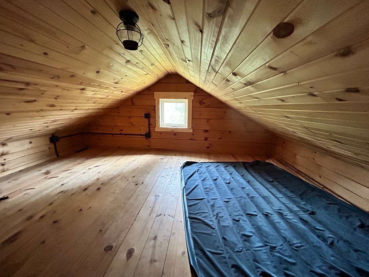 Upper loft- bring your own air mattress or cots! Ceilings are low. 