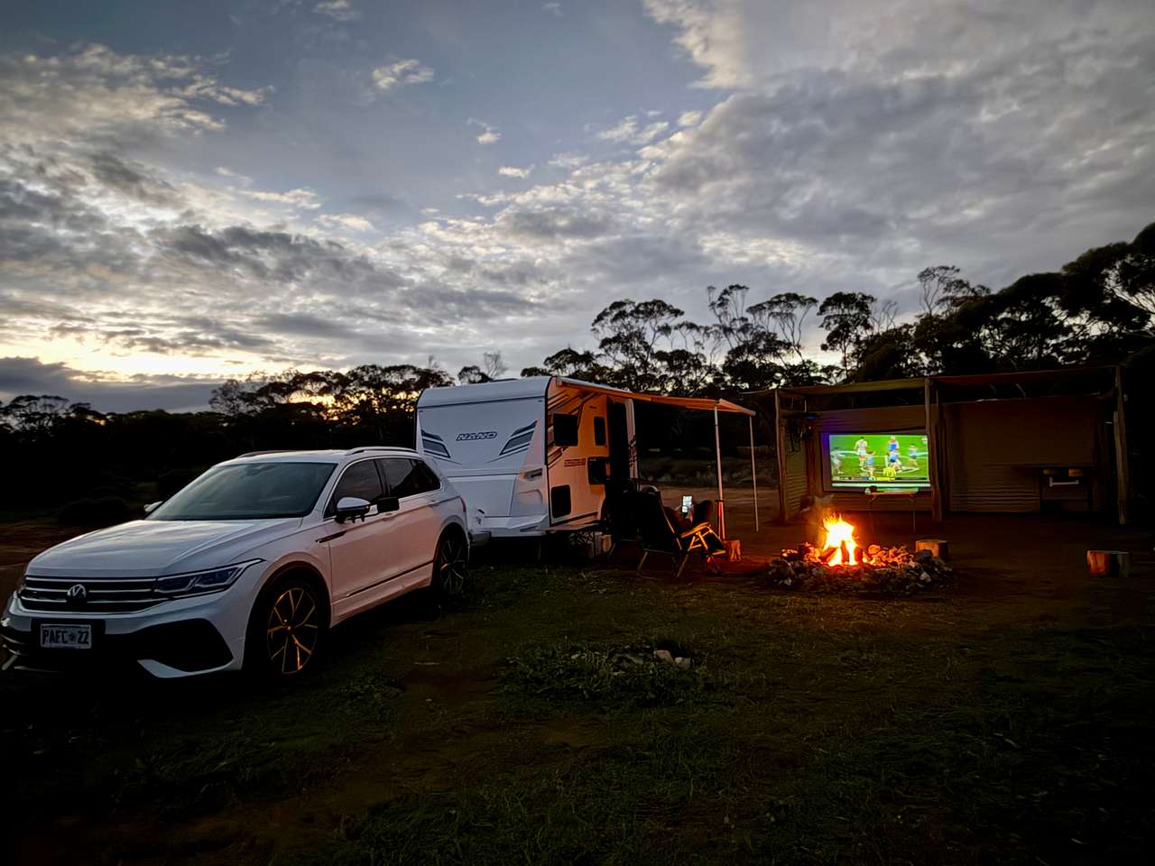 We used the shelter to hang our screen for the projector so we could watch footy by the campfire. 