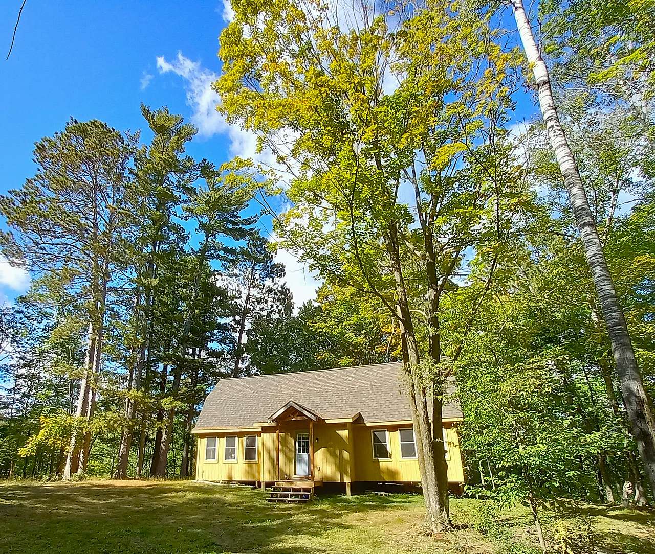 Cozy Woman Lake Woodland Cabin