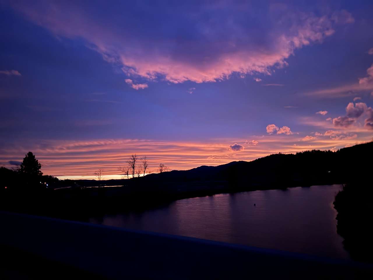 Sunset on the river from the Trail of the Coeur d’Alenes - walking distance from our property. 