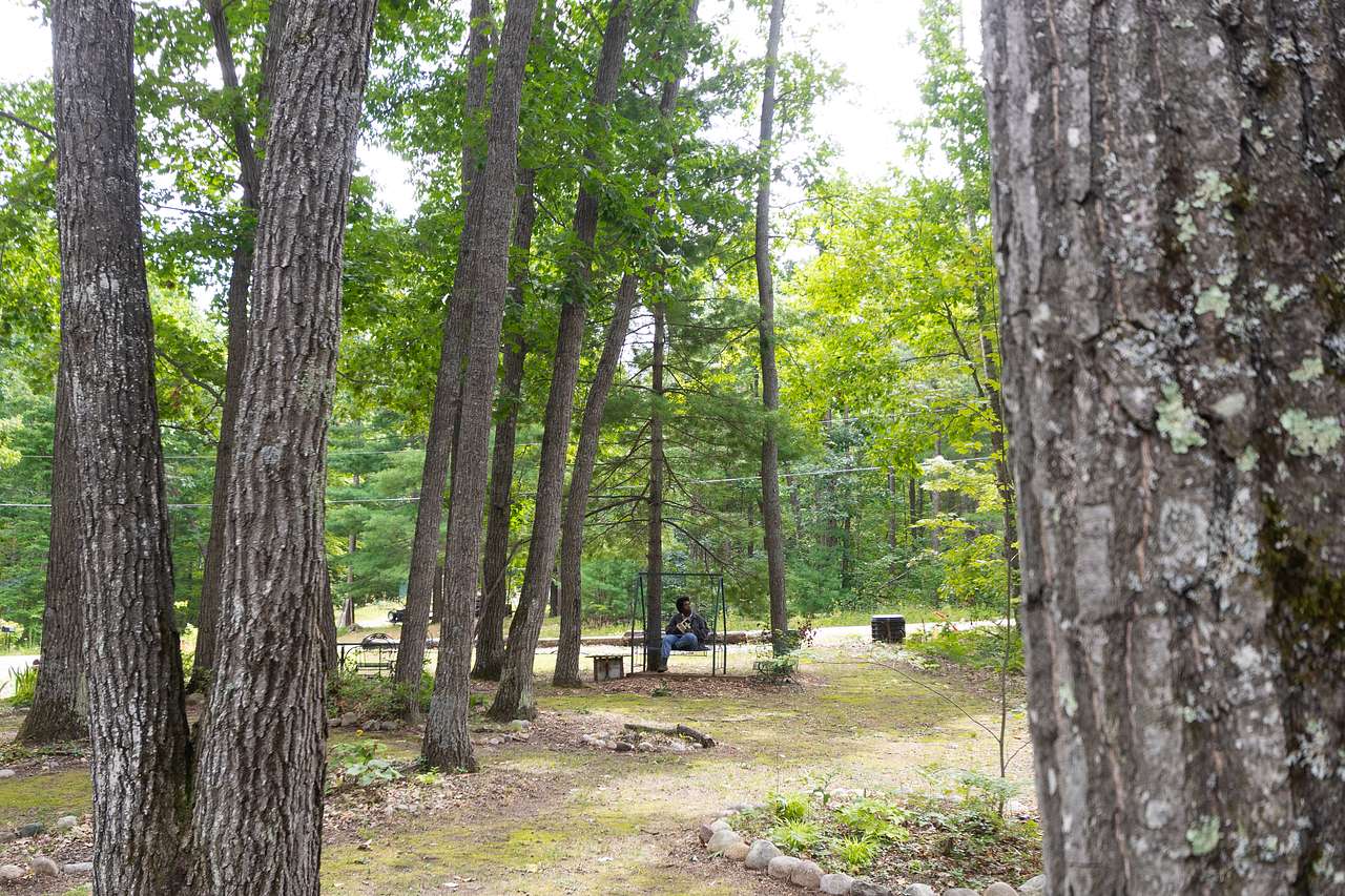 The large front lawn has plenty of seating options to sit and take in the view.