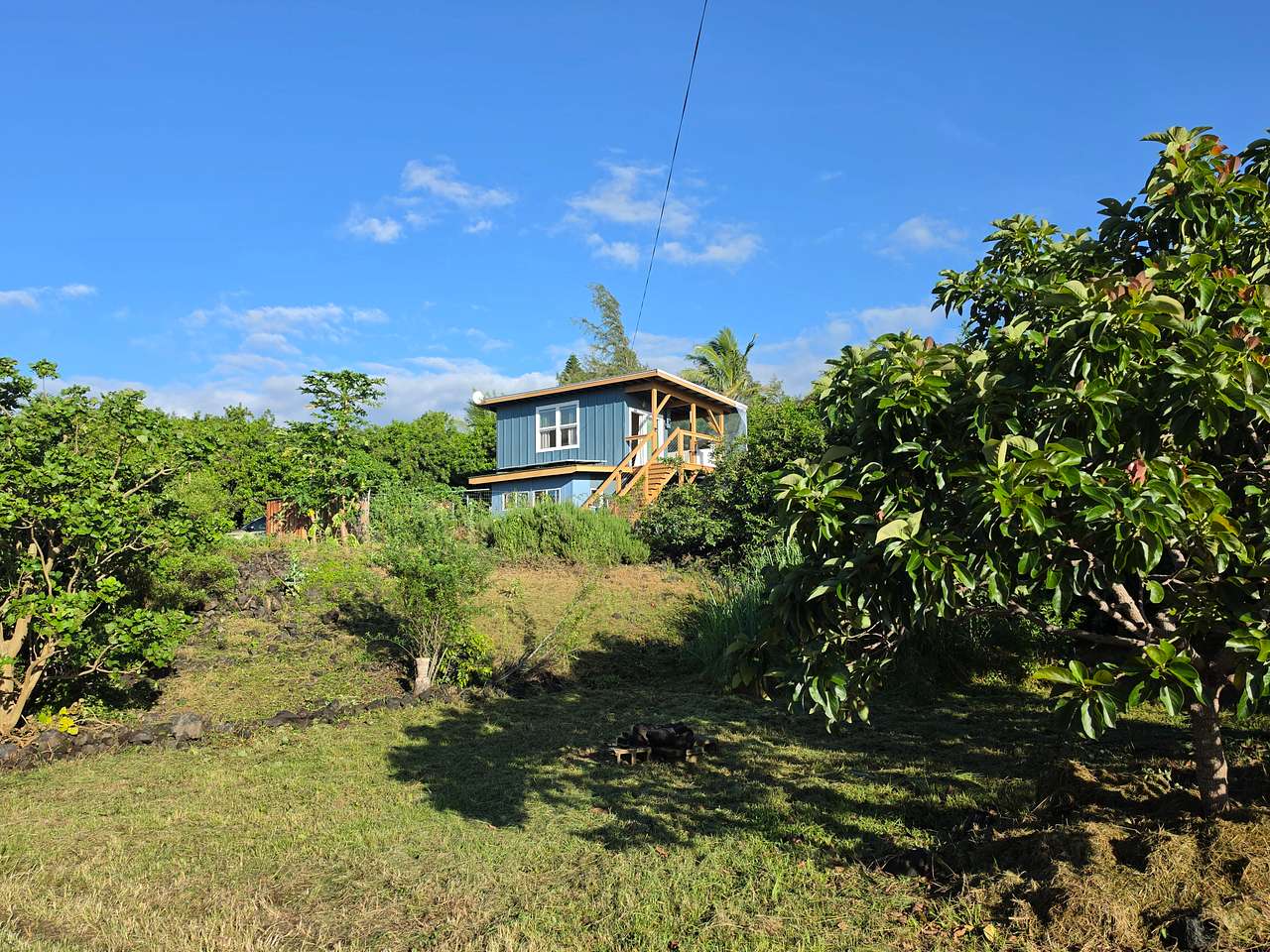 Tiny house nestled on a 1 acre farm lot
