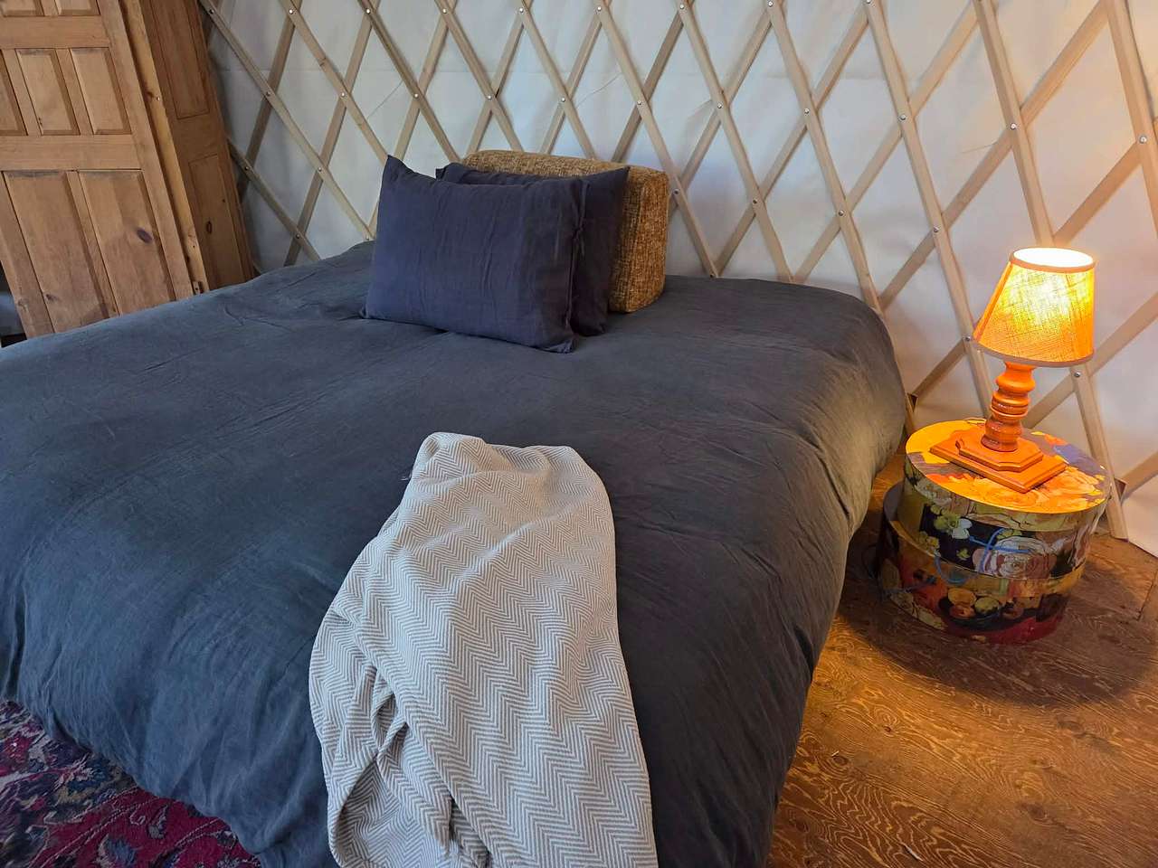 king-size bed with down duvets and pillows; please bring your own bed sheets