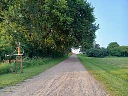 Welcome sign at the end of our driveway.
Watch the fire number our gps dot is farther north than we are.