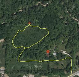 Follow yellow path to campsite. Take left off driveway into grass. Go past the house and barn. Trail starts just past the barn.