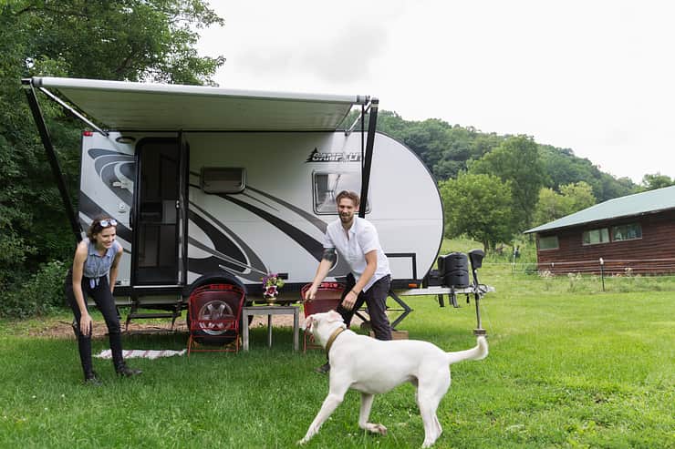 couple-with-dog-by-rv