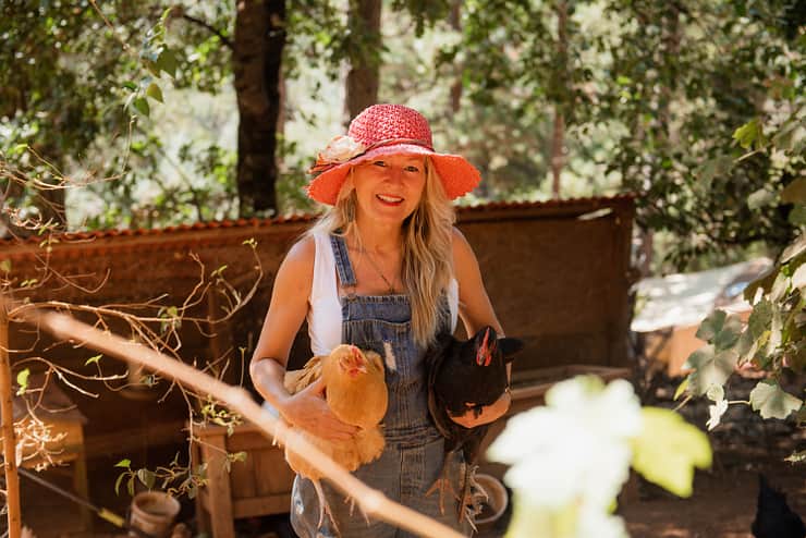 host-holding-two-chickens