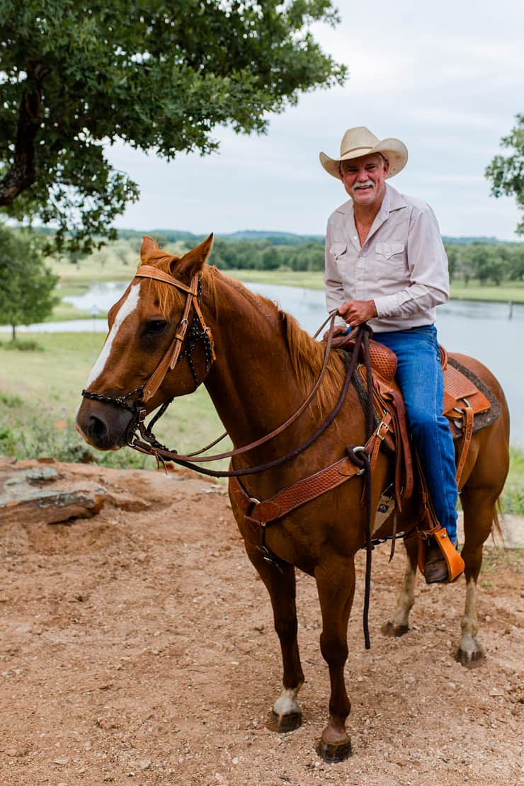 host-on-horseback-by-pond
