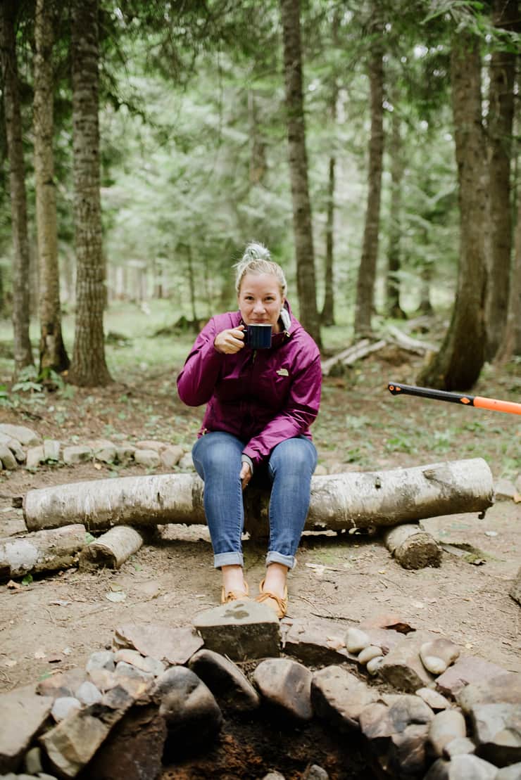 host-sipping-coffee-in-forest