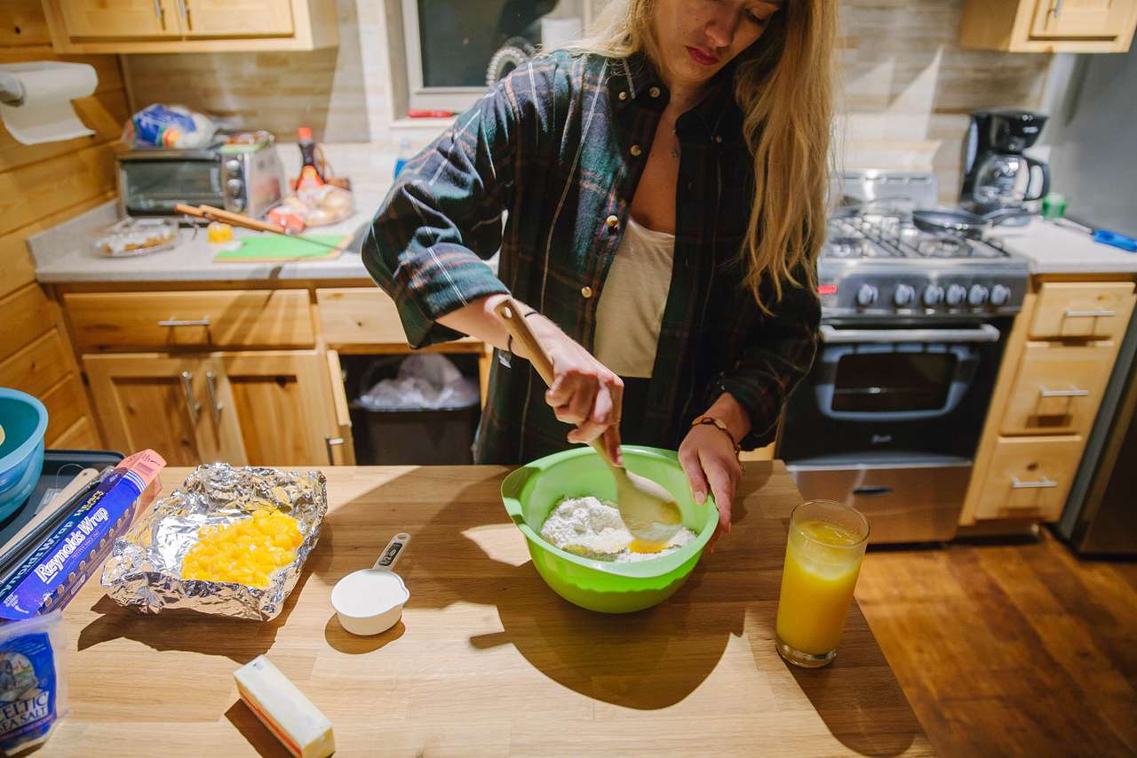 Mixing a cake together.