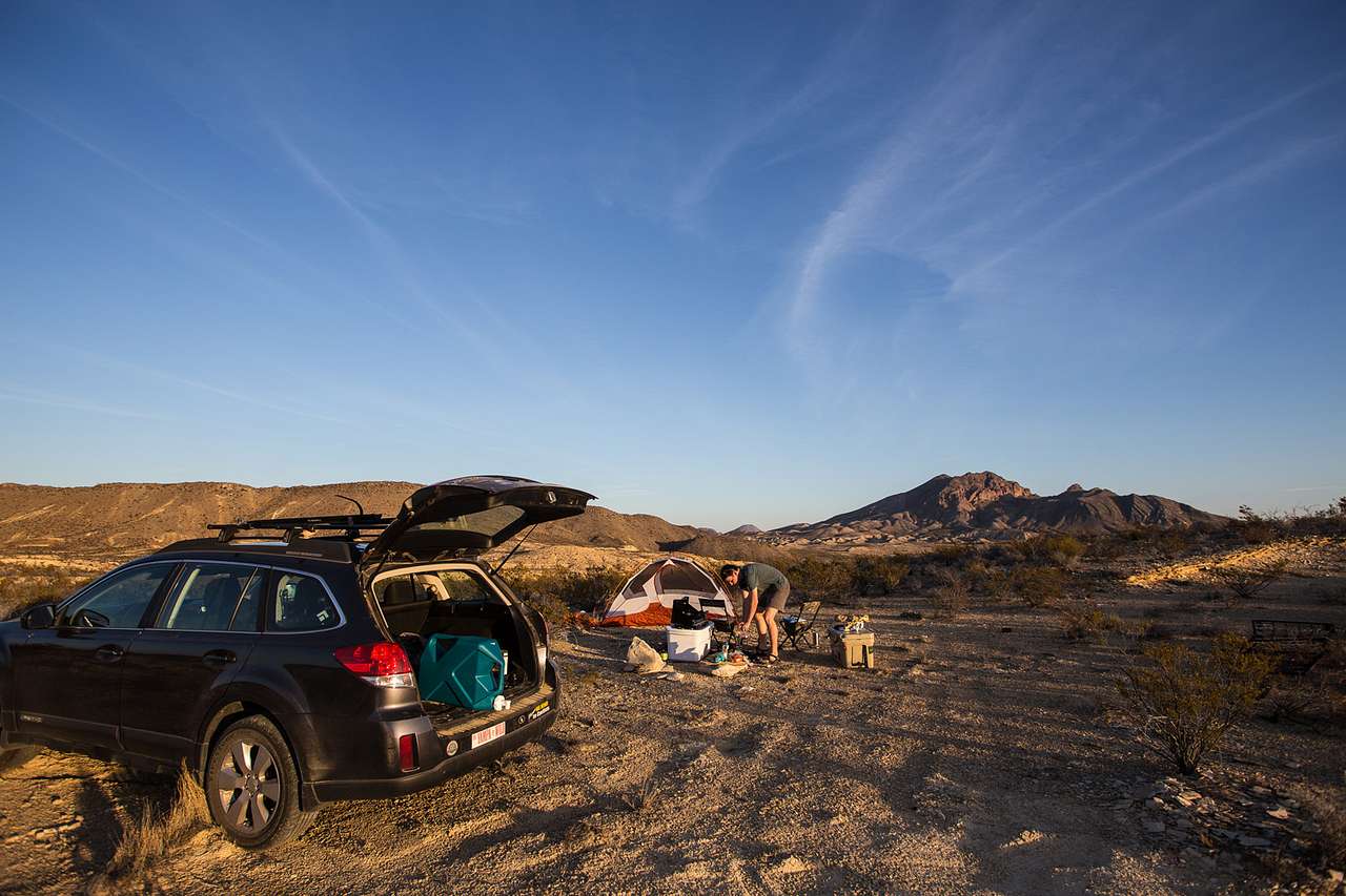 Our campsite set-up for the night, with mountains in view. There aren't any picnic tables or surfaces at the site, so be sure to bring something you can use to cook on.