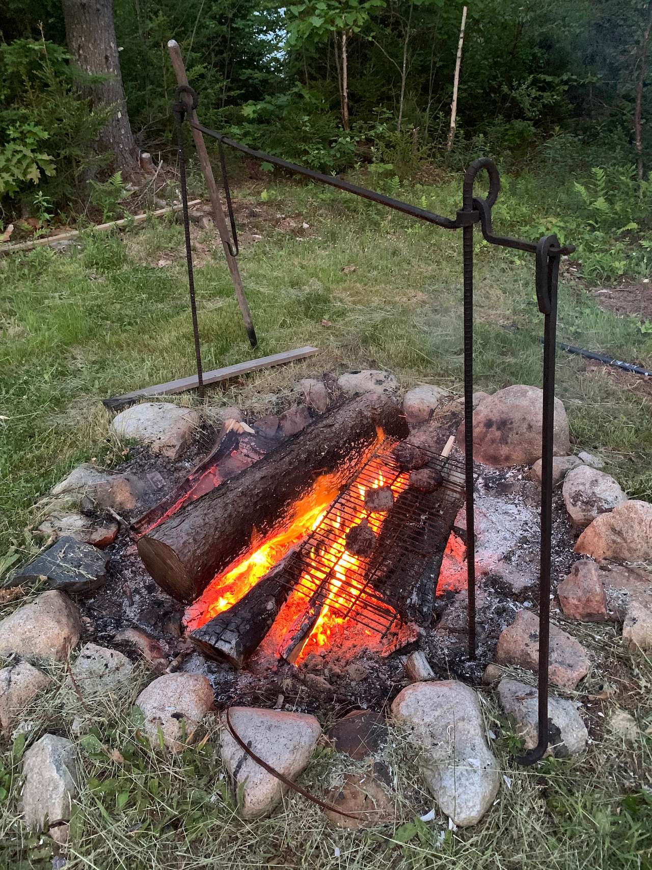 You'll have a large campfire area with a grill rack to make food on.