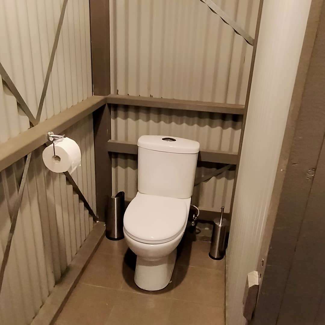 Toilet and shower block