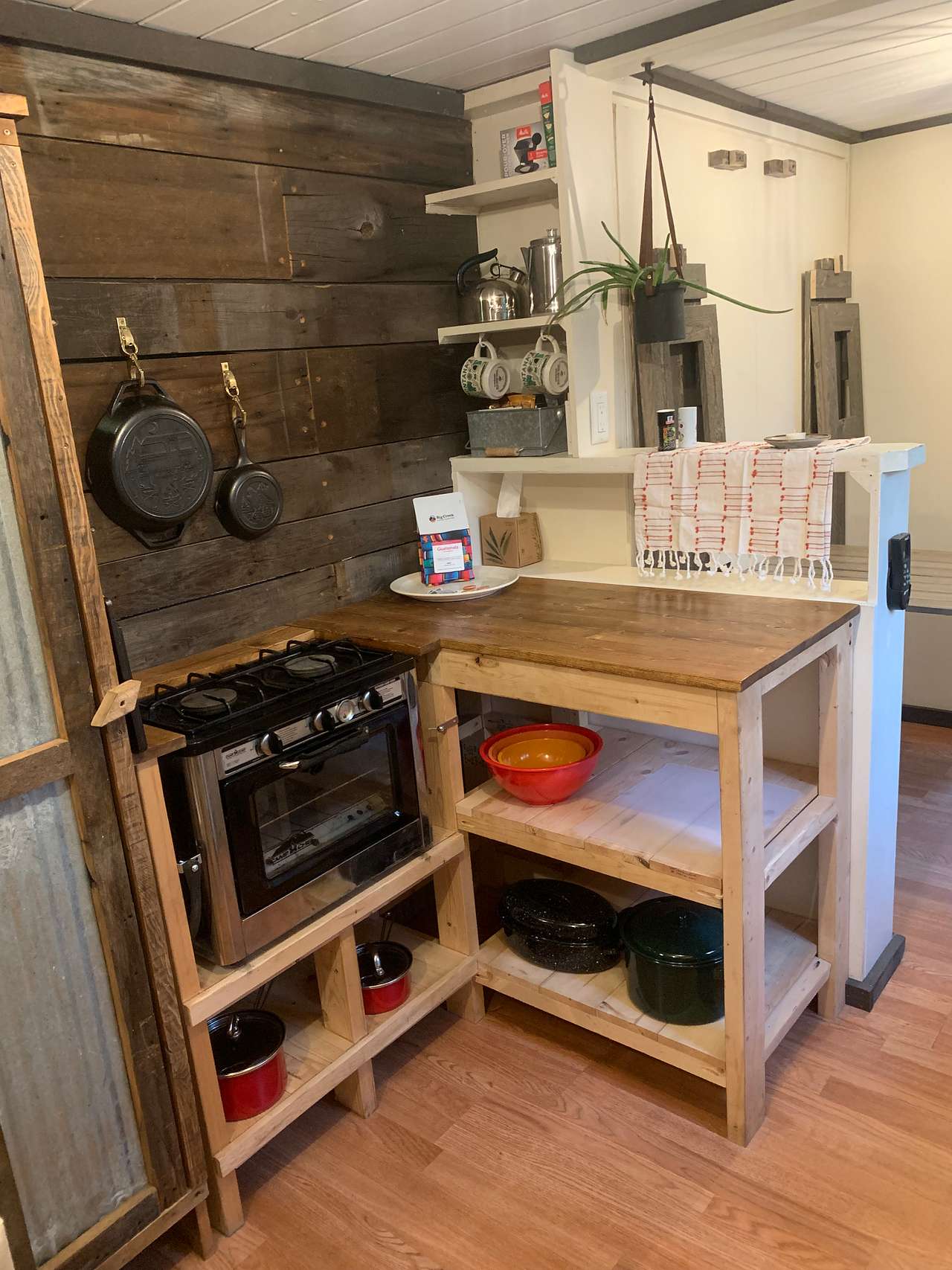 The kitchen has the basics for cooking or heating up water for hot drinks.