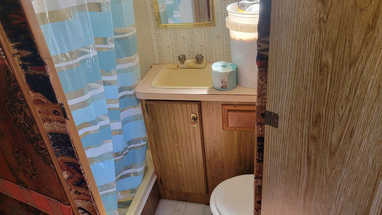 Bathroom with shower and compost toilet