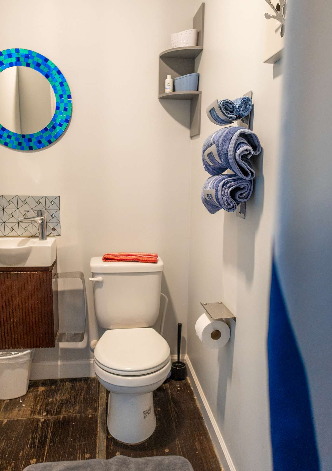 The shipping containers features bathrooms with a toilet, shower and sink.