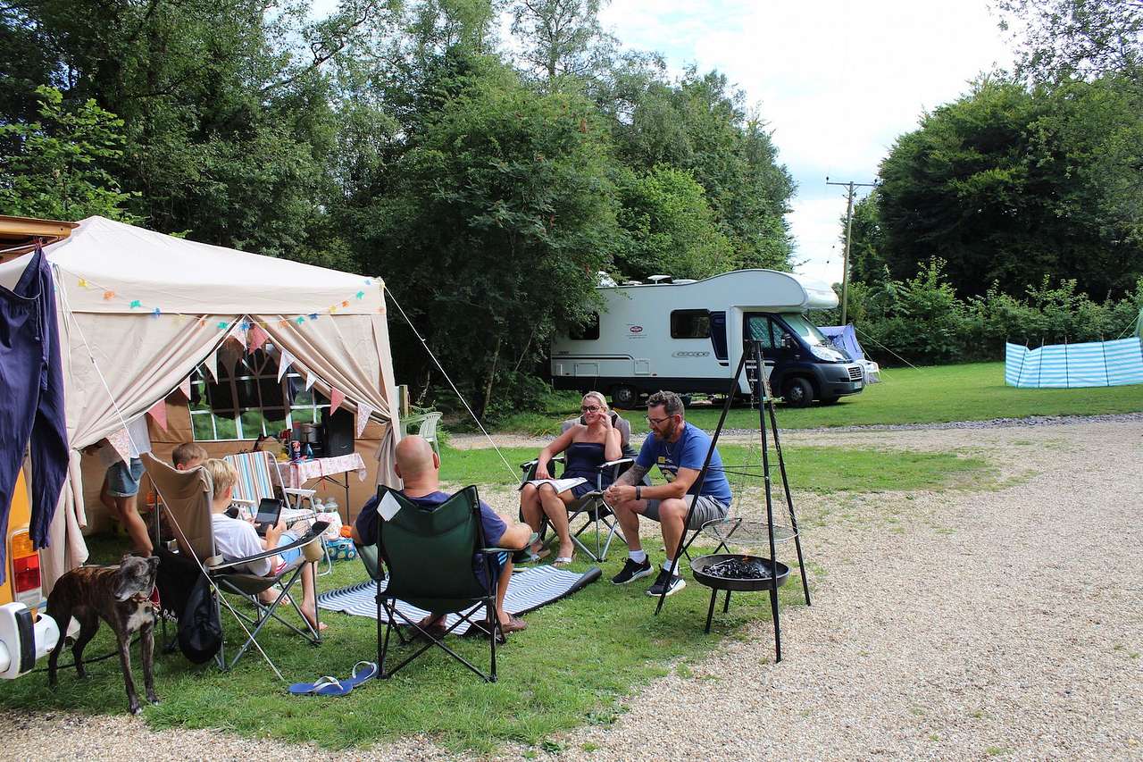 A beautiful countryside spot in Devon with a range of pitches, from grassy open spaces to off-grid woodland clearings, topped off by two well-stocked fishing lakes.