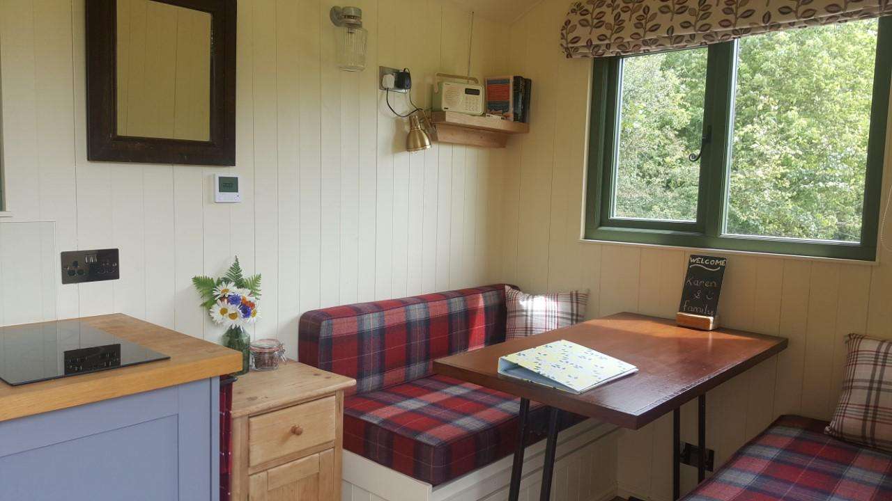 Dining area converts to a comfy  double bed