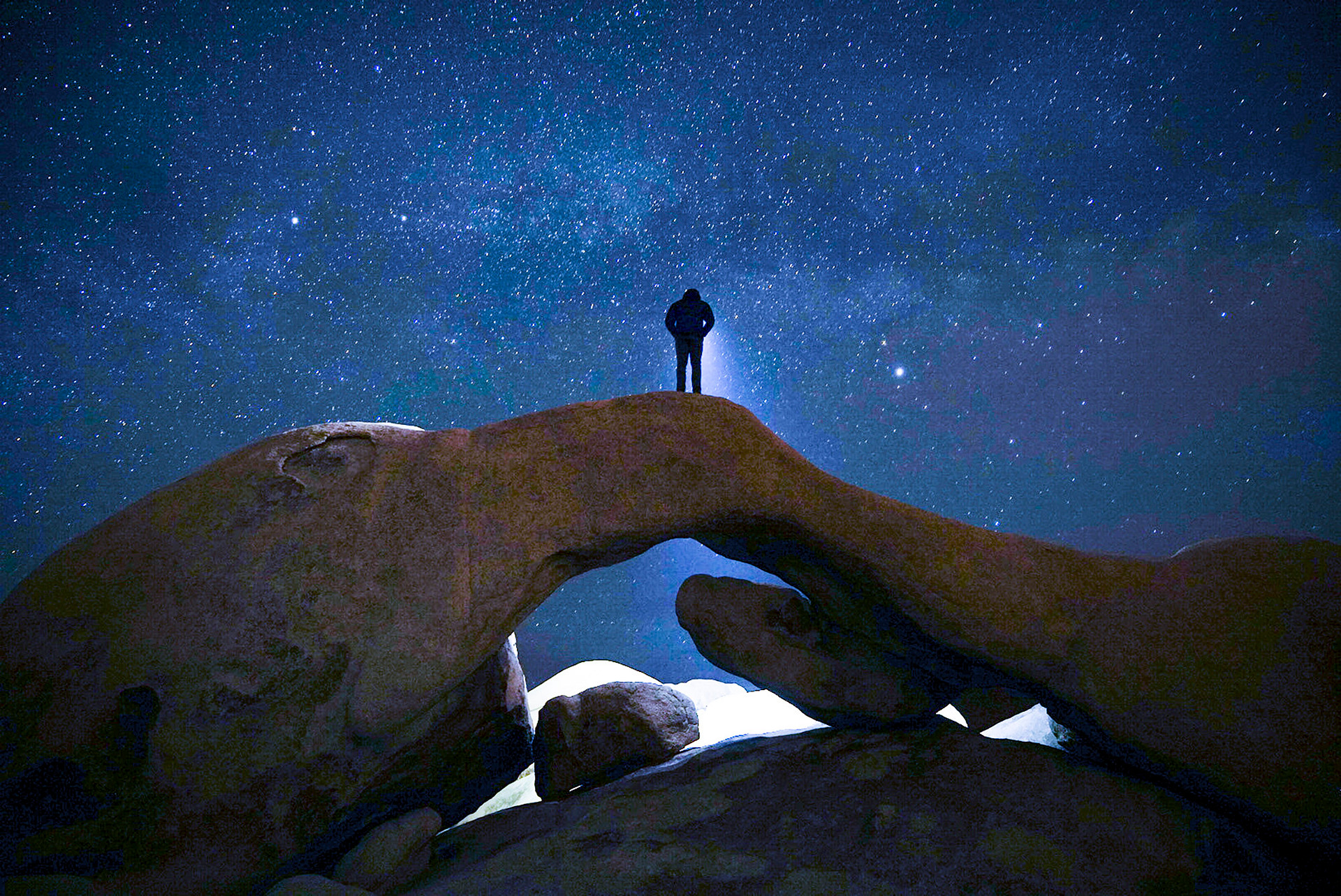 Exploring the arch under the Milky Way.  Moonless nights are the best.