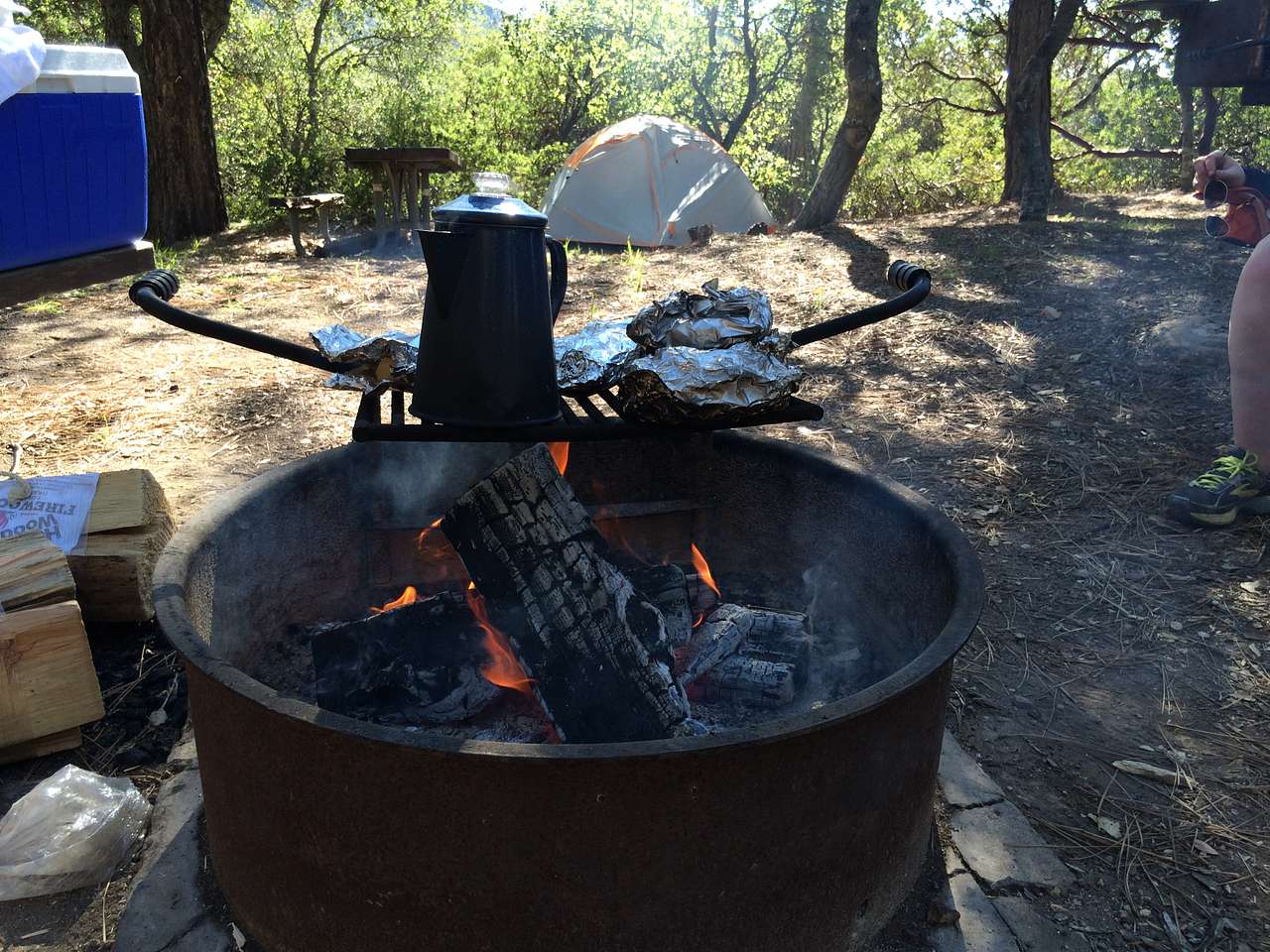 Two grills - one stand up one and the grill over the fire pit.