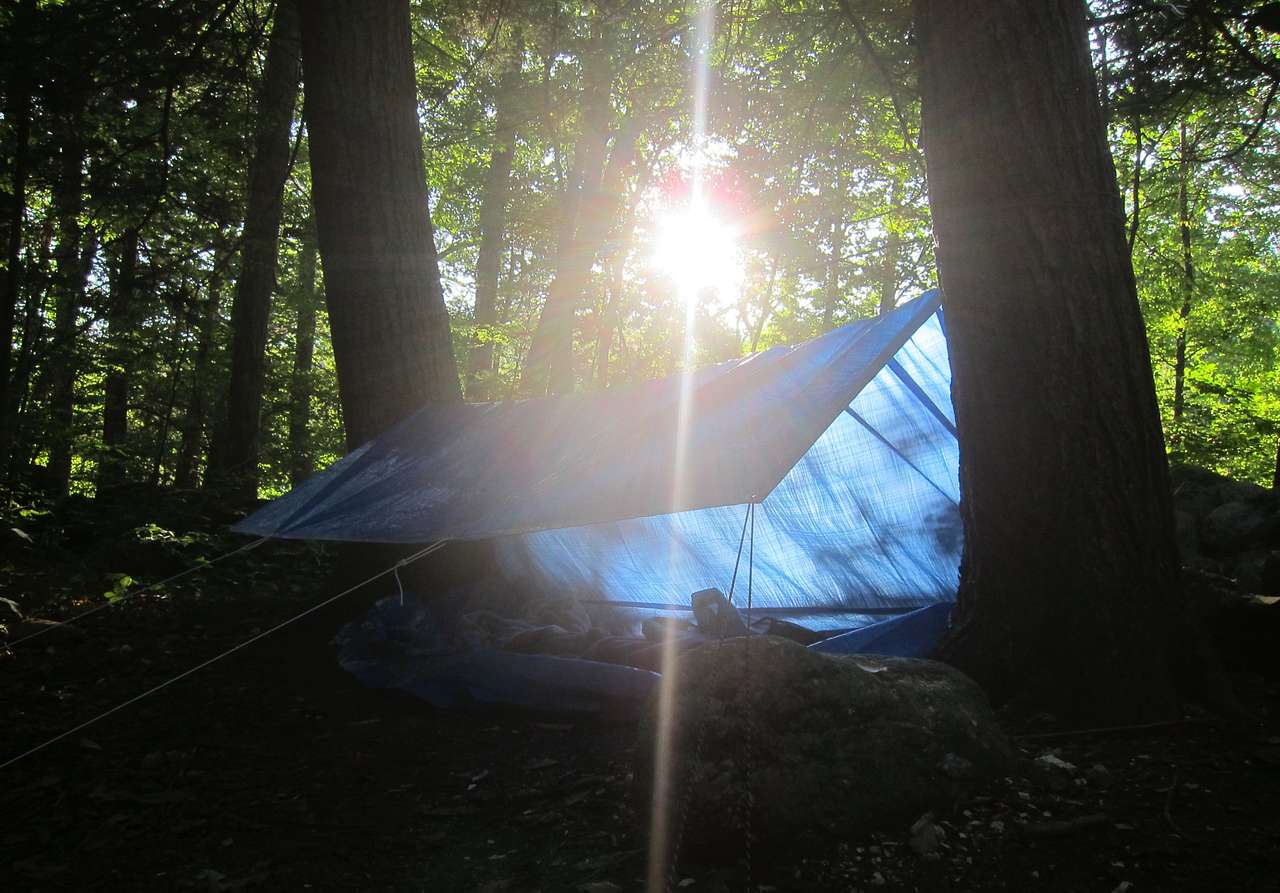 No tent? No problem! With backpack gear in my storage unit I got a $7 tarp and parachord and built a sweet lean-to shelter in Connecticut gaining badass girl points with trail mates. Awesome circuit hike with both water and nearby Appalachian trail access. 