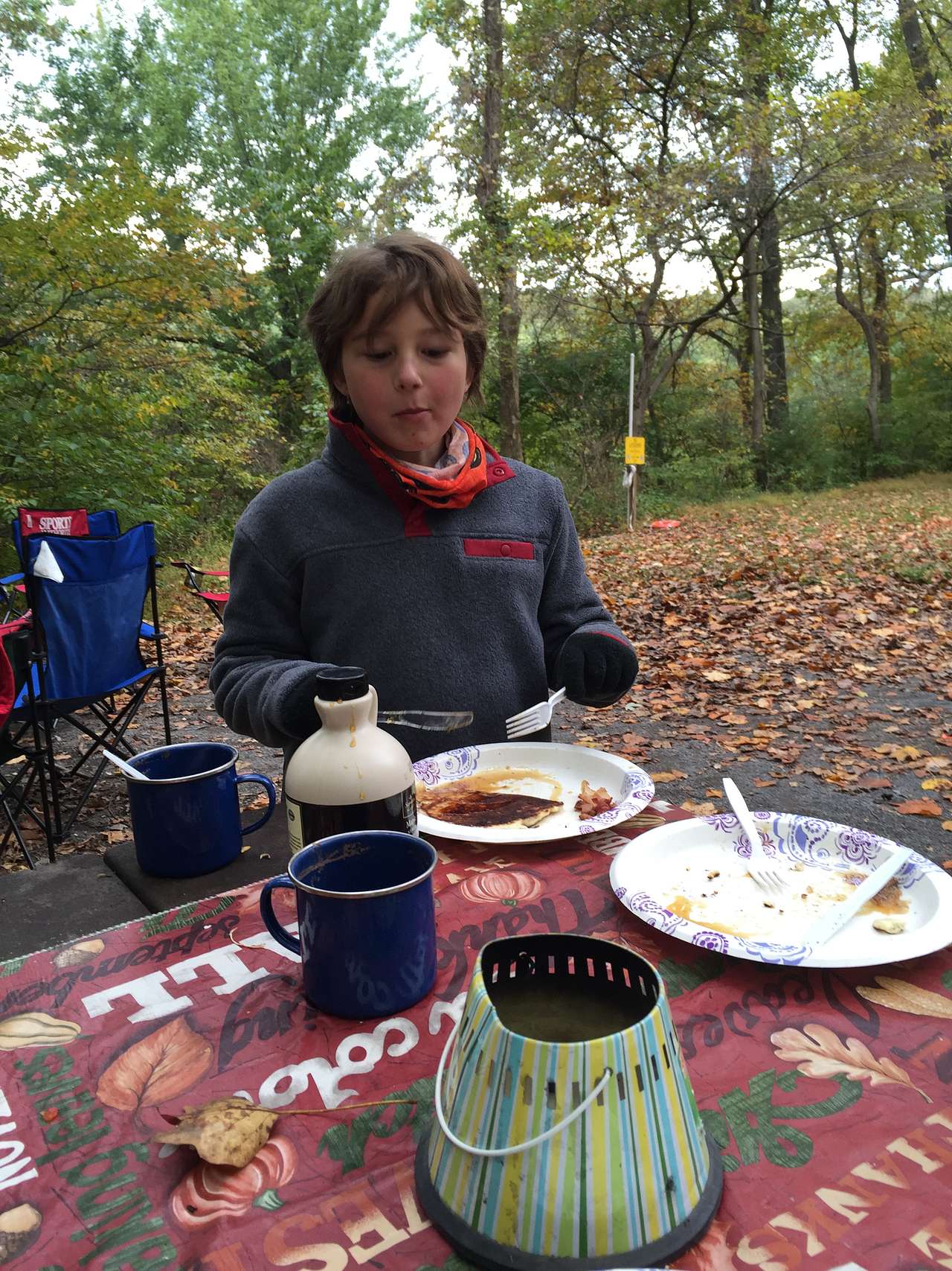 Enjoying breakfast and hot cocoa on a chilly morning.