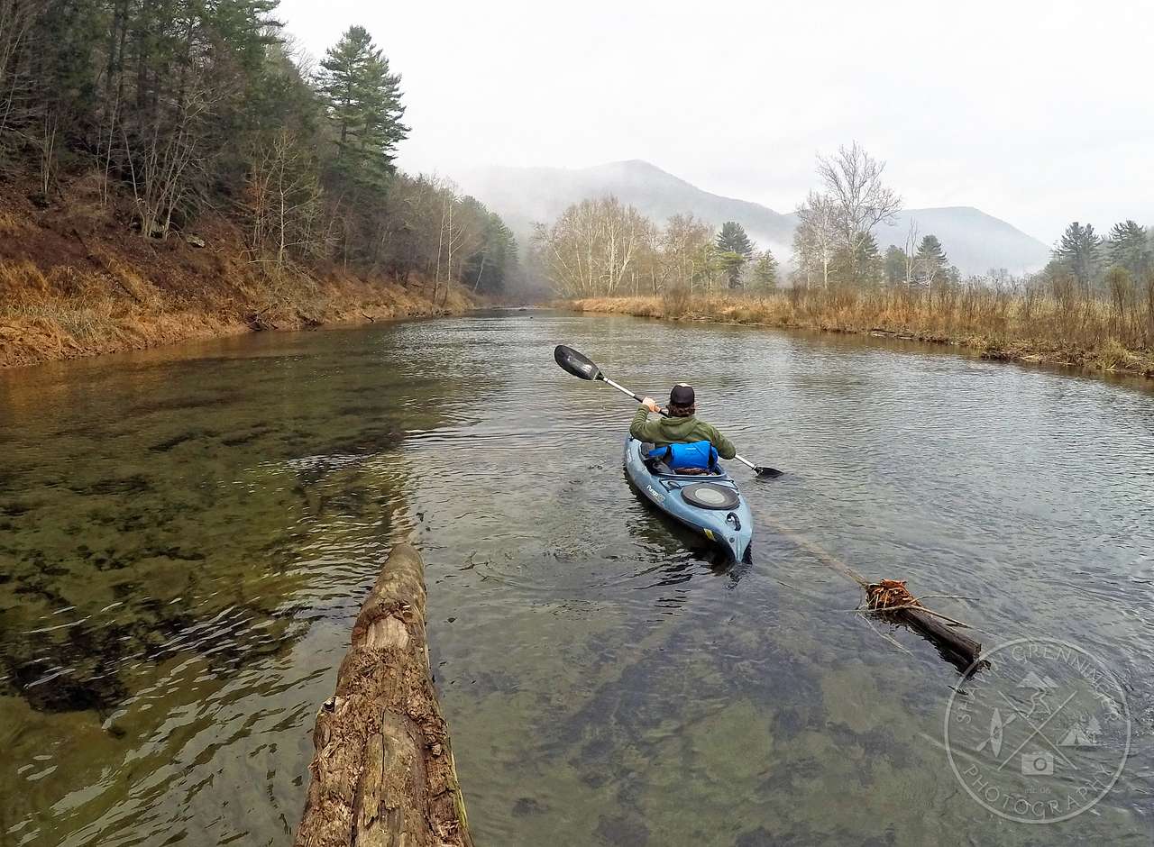 Kayaking upcreek on Little Pine about the dam to do some fishing