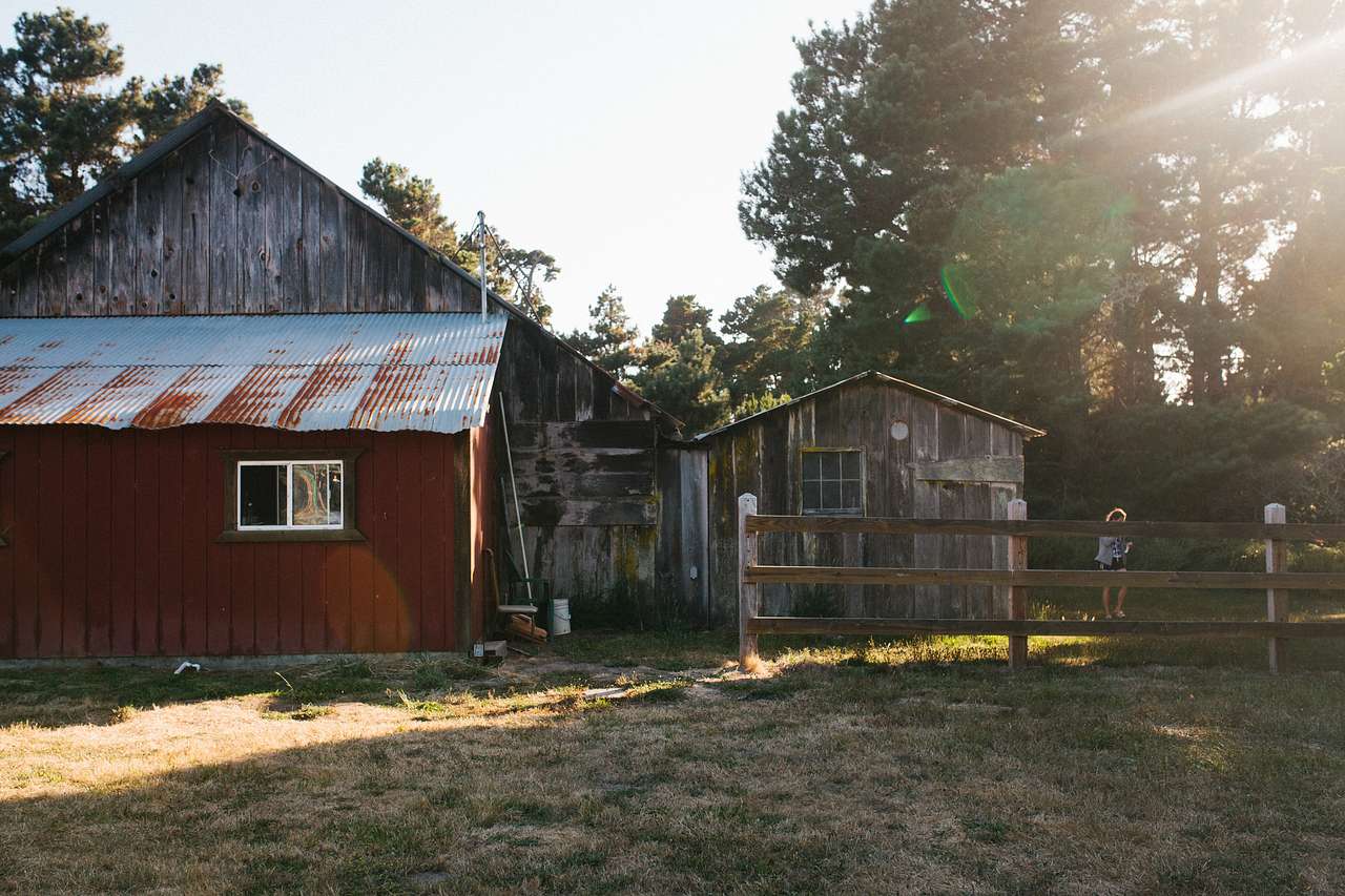 There is a large barn located to the right as you drive onto the property. The owners hosts town events within this space. There's even a horseshoe area!