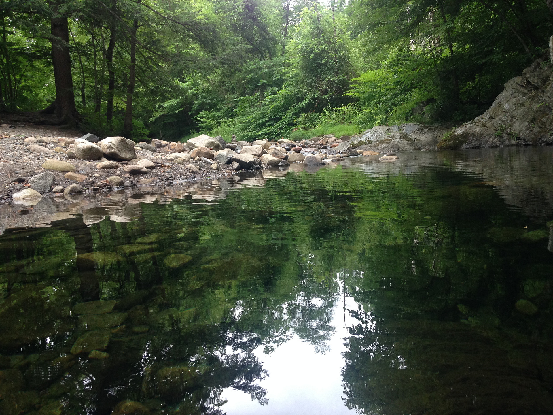 One trail leads to a serene stream