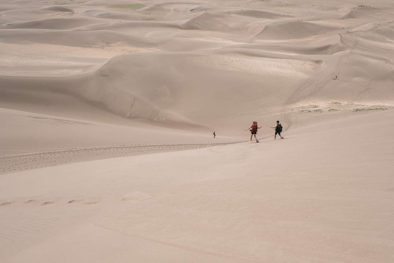 Walk, sandboard, or just jump down that sinkin' sand!