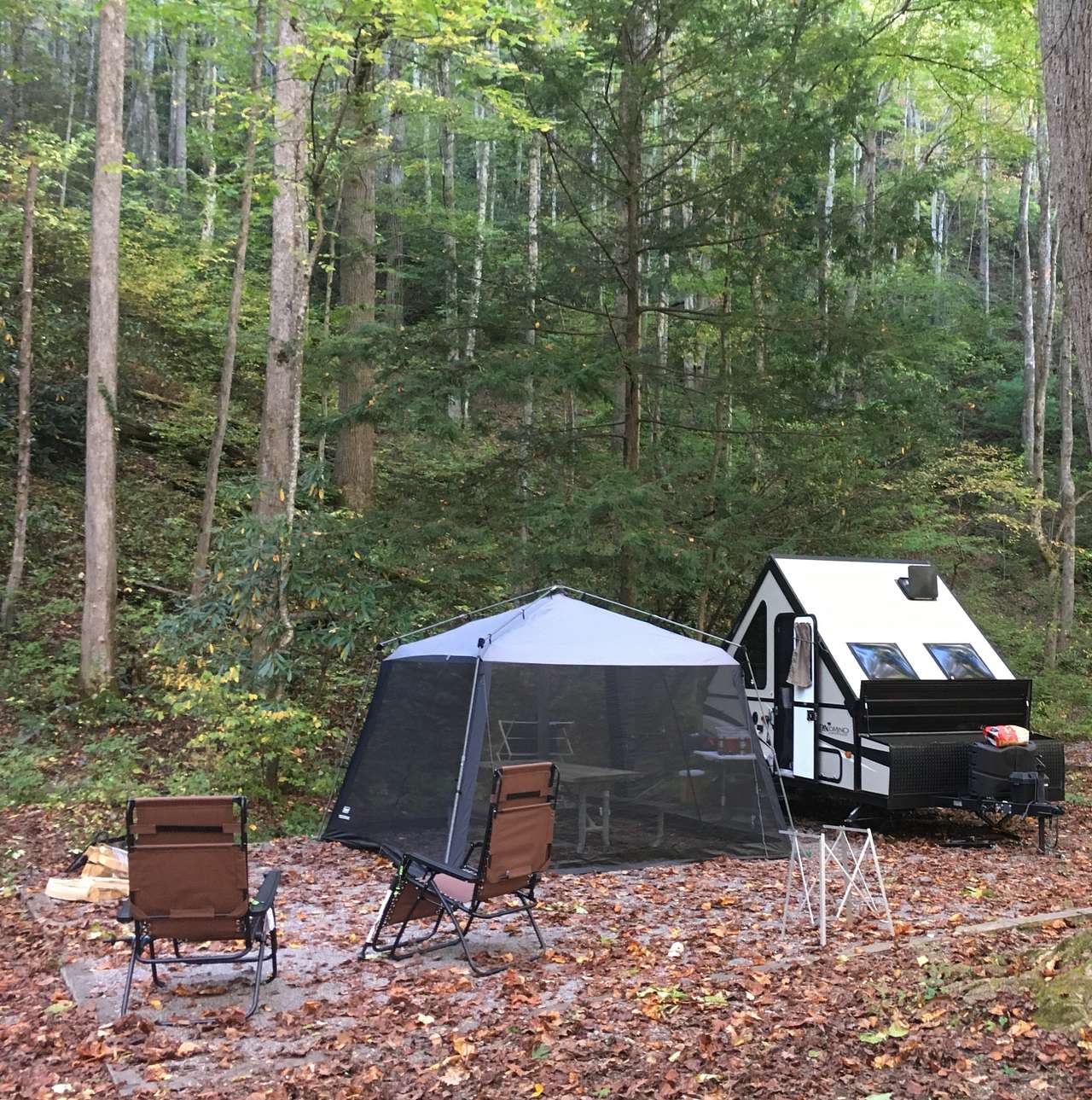 Beautiful campsite next to a mountain.