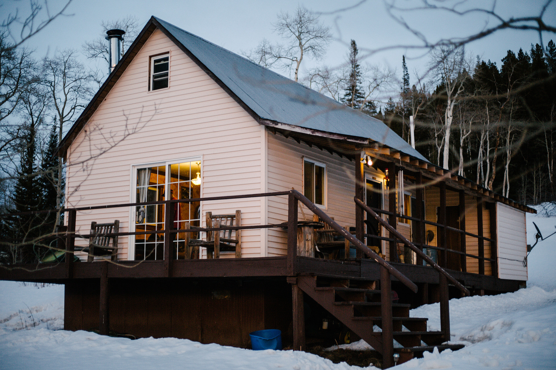 The view of the cabin right off the driveway. Be sure to bring a snow-capable vehicle in the winter!
