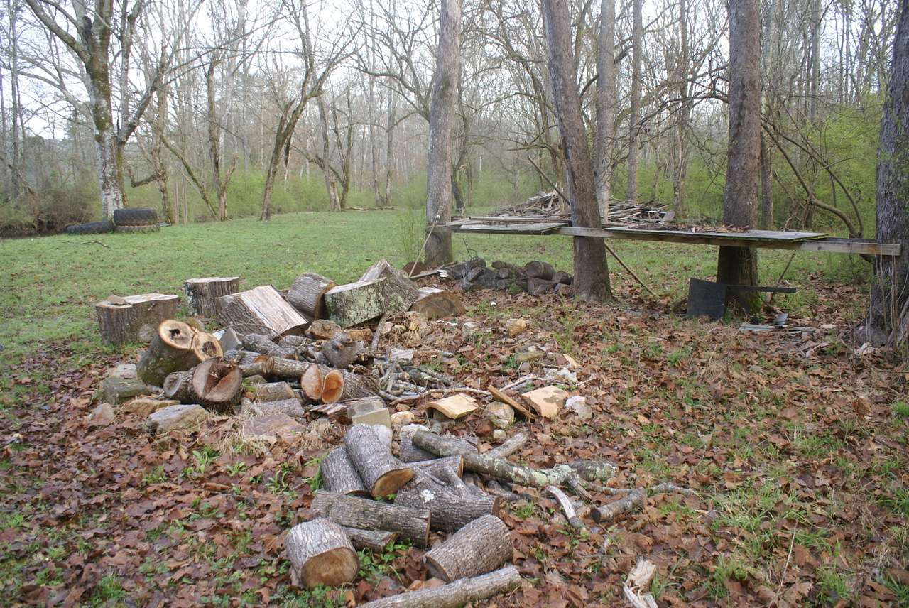 Fire pit with wood and prepping table.