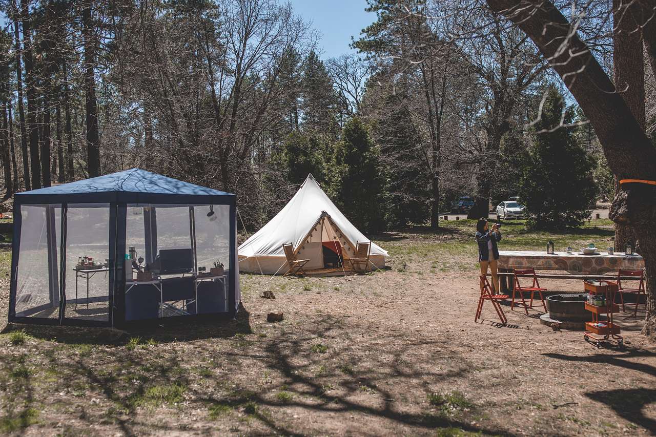 A look of the whole campsite with kitchen and firepit.