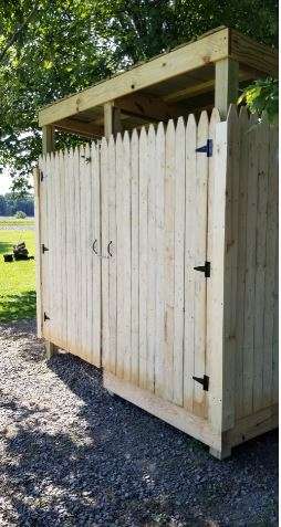 We have constructed a little outbuilding with a camp shower and camping toilet for campers use.