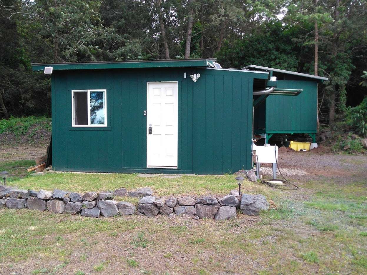 Cabin 2 with wash basin. Comfort Station in the rear