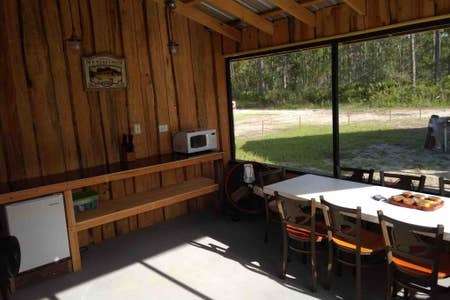 This is the enclosed sitting area to enjoy your meal.  Complete with small fridge and microwave.  ( Please note this is a shared area)