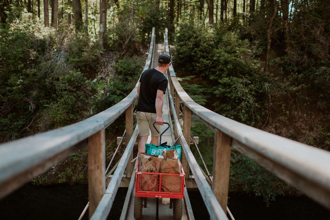 Once the wagon gets closer to the other side, it helps to have a person on the front and back of the wagon guide it up the slope. 