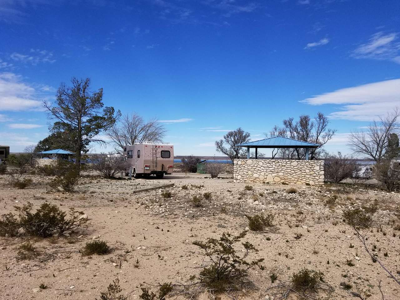 Another view of campsites with the water on the other side.