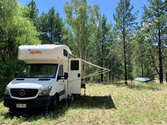 The Enchanting Site - a nice, big, flat site for large groups or multiple set ups with a nice mix of sun and shade. Close to the swimming hole. 