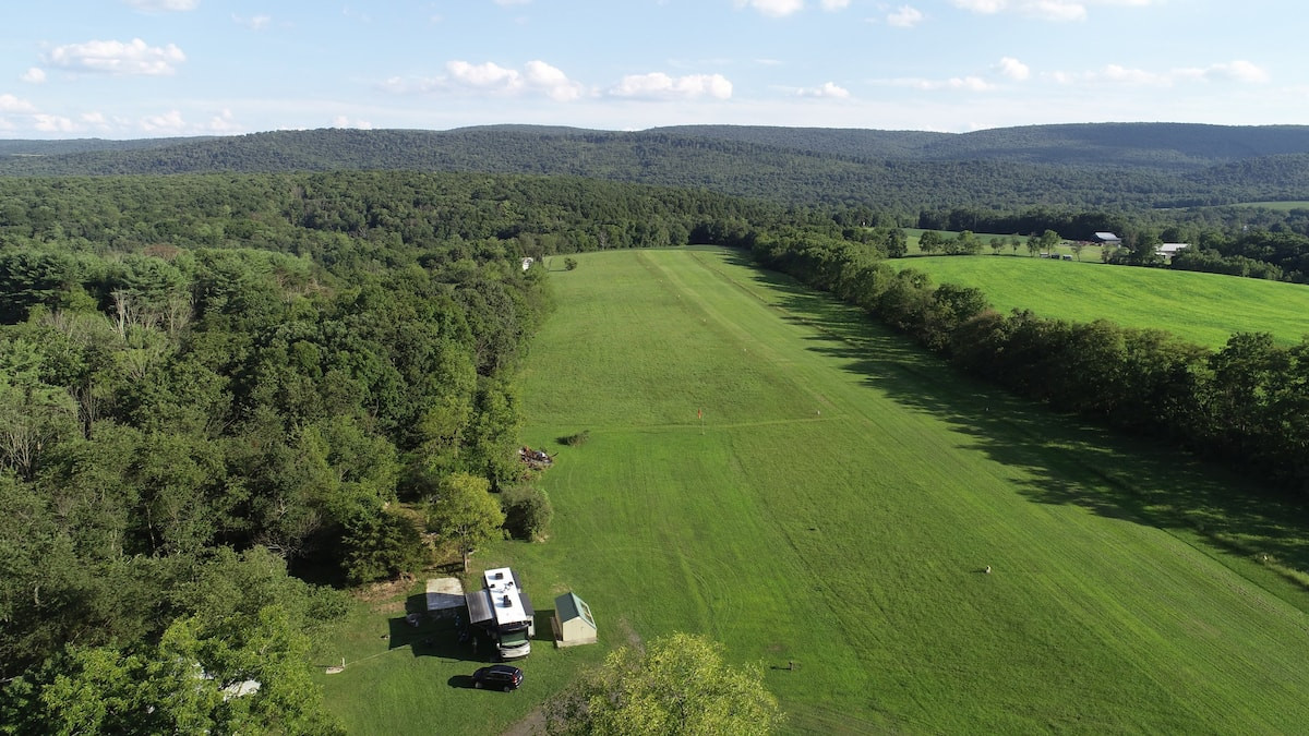Showing 45' RV on site with multiple slide outs.