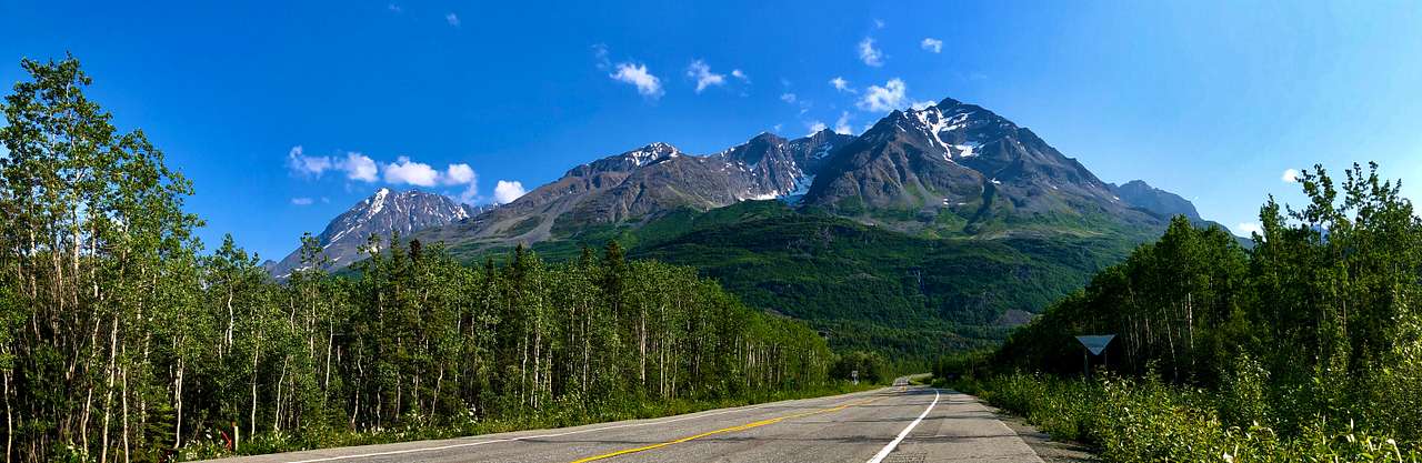 The beautiful Chugach Mountains, as seen from the driveway entrance to the Raven's Den campsite (bottom left corner of picture), on the Richardson Highway.  Milepost ~45.8
