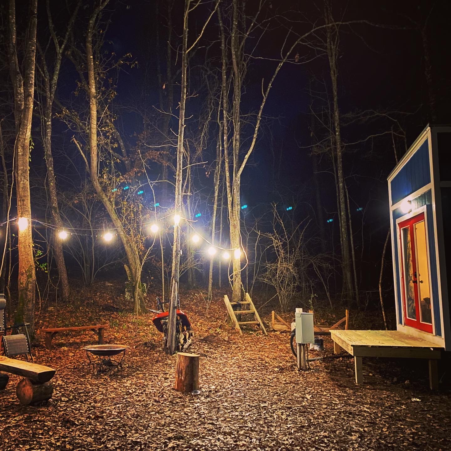 Campfire and benches next to my tiny house. Come over and roast some marshmallows. 